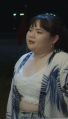 Chompoo in line for dinner, after Pat cuts in front of her, in Episode 6